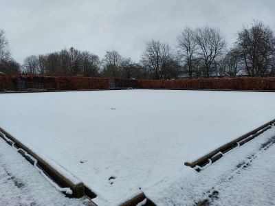 Snow on the bowls green